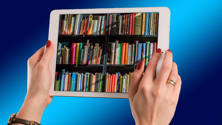 A tablet being used for reading, representing low-cost media and family tablet shopping.