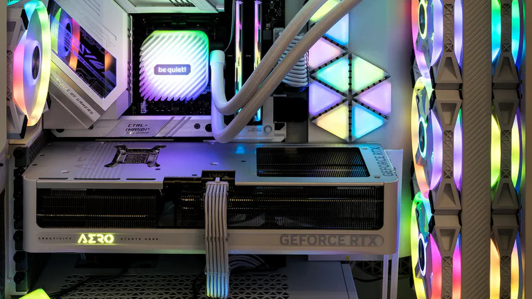 Representative open PC interior showing a graphics card, memory, cooling and case airflow for a custom PC build guide.