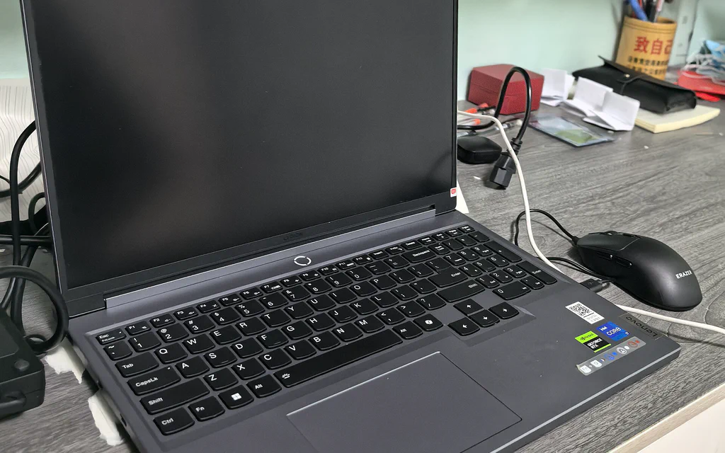 A Lenovo Legion gaming laptop on a desk, used as a representative gaming laptop buying guide cover.